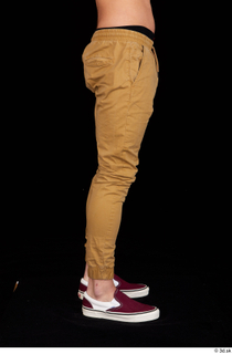 Pablo brown trousers dressed leg lower body red sneakers 0007.jpg